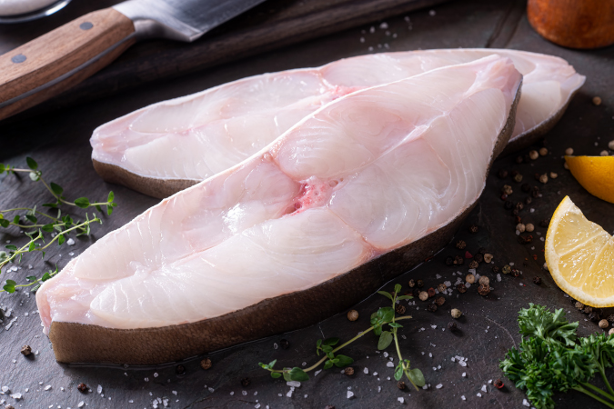 Halibut steaks on slate